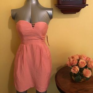Brand new with tags BCBG peach dress. Size 4